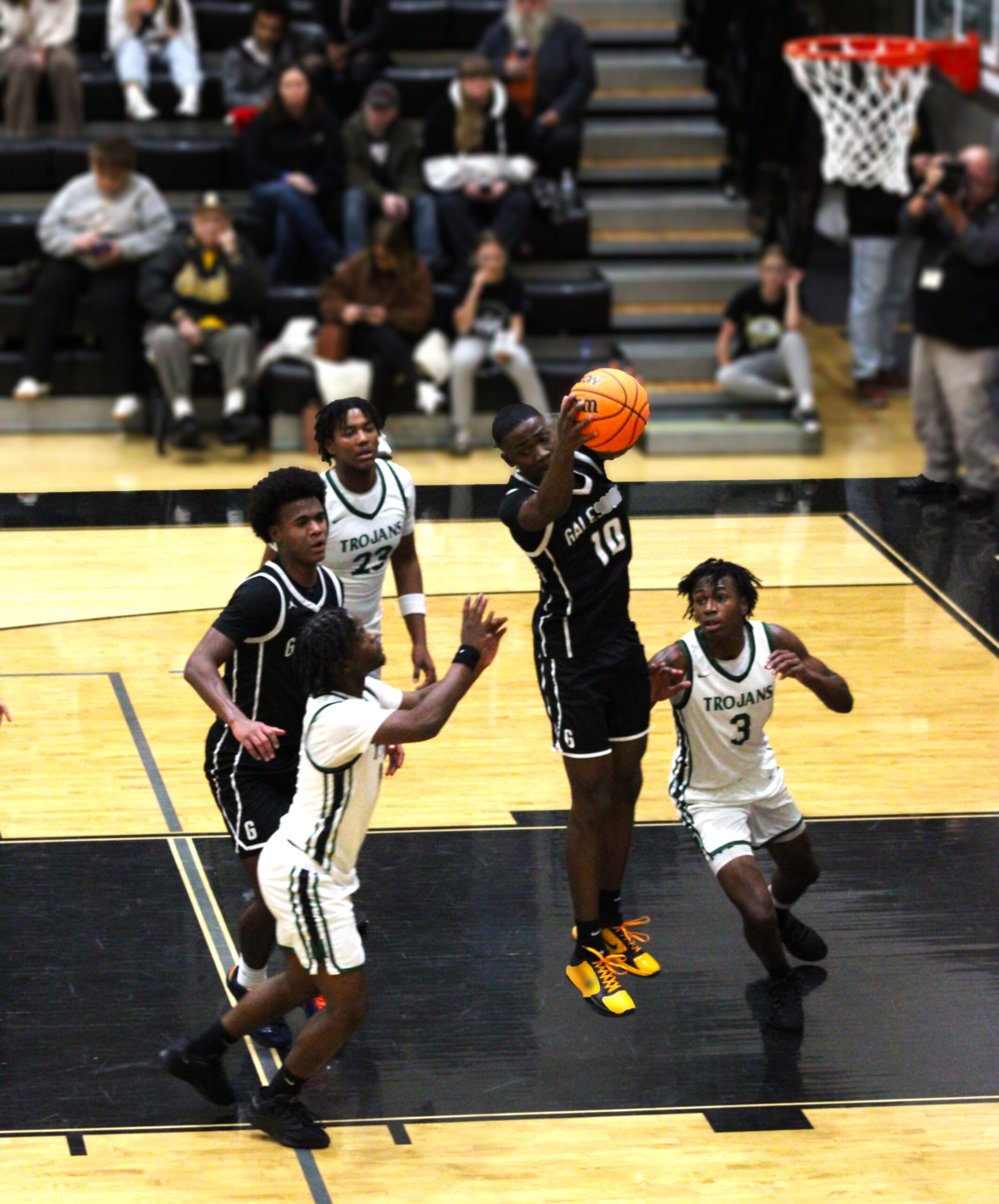 Galesburg boys cruise to 69–25 win in tourney opener